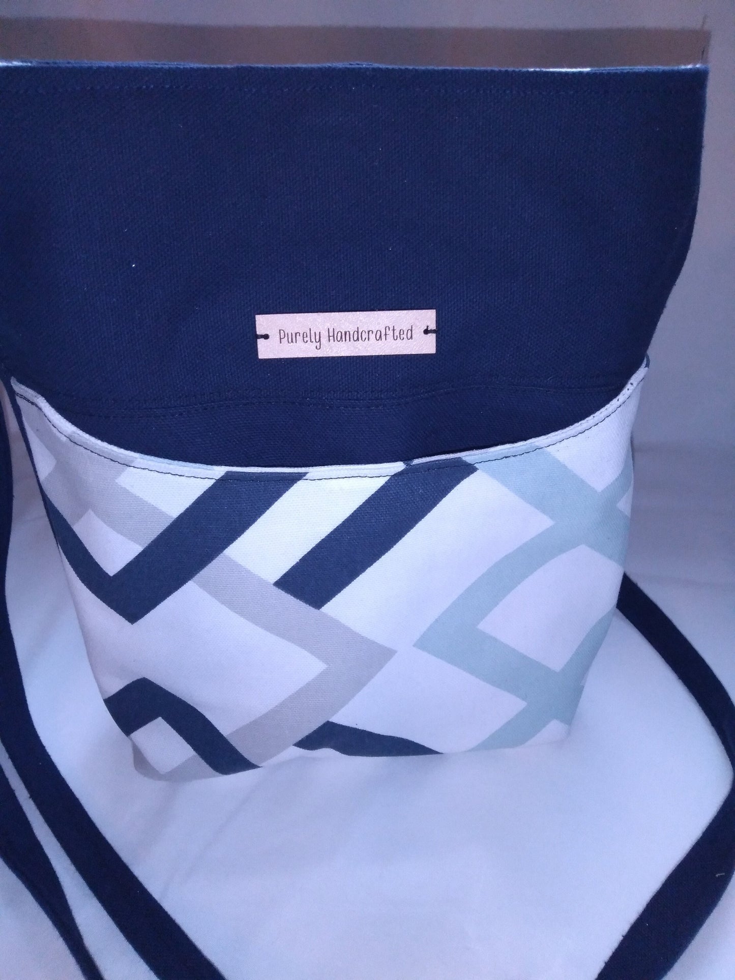 navy blue geometric canvas crossbody bag
