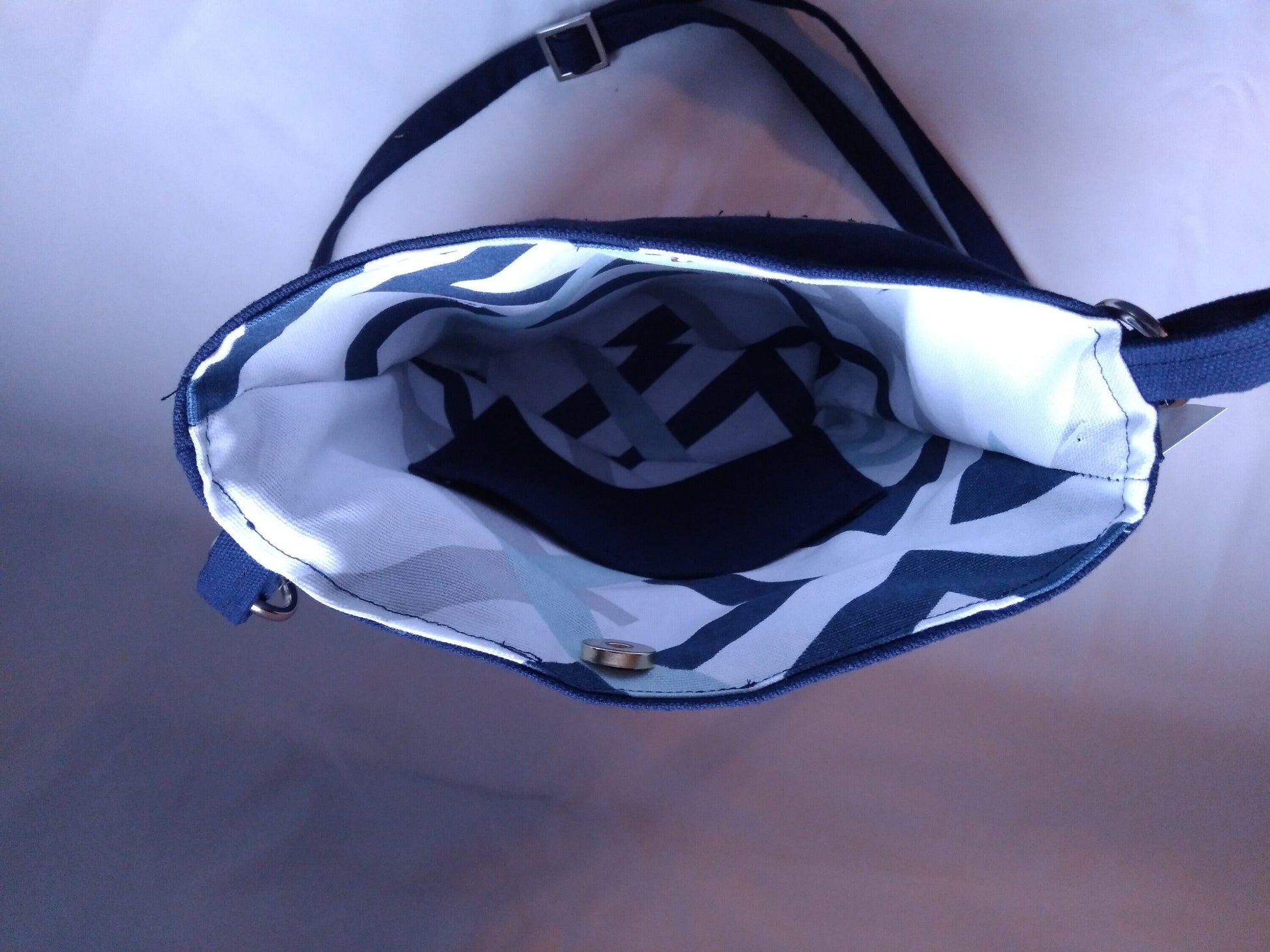 navy blue geometric canvas crossbody bag