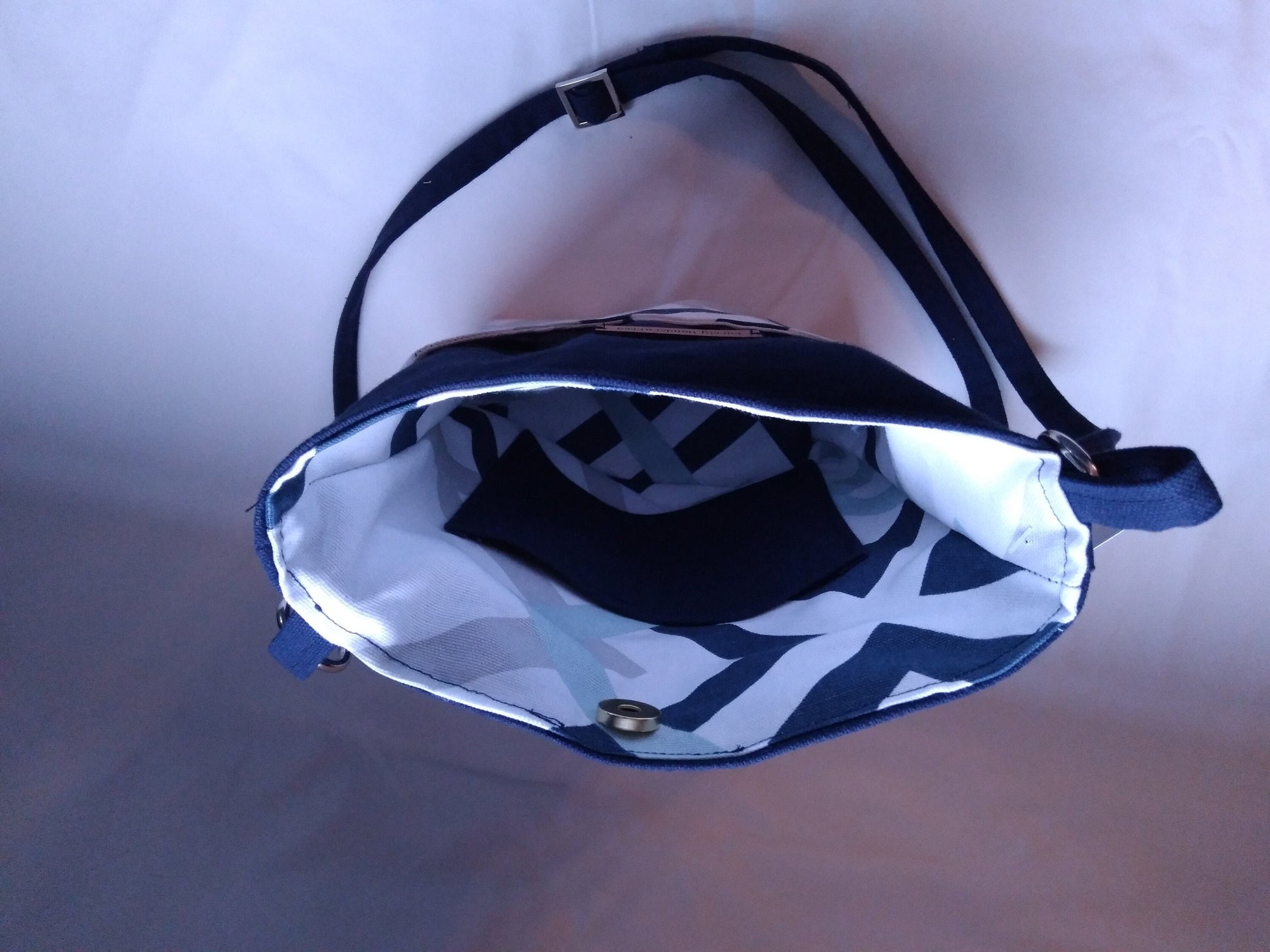 navy blue geometric canvas crossbody bag