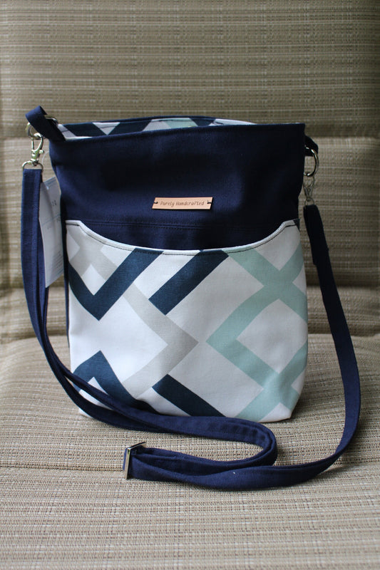 navy blue geometric canvas crossbody bag